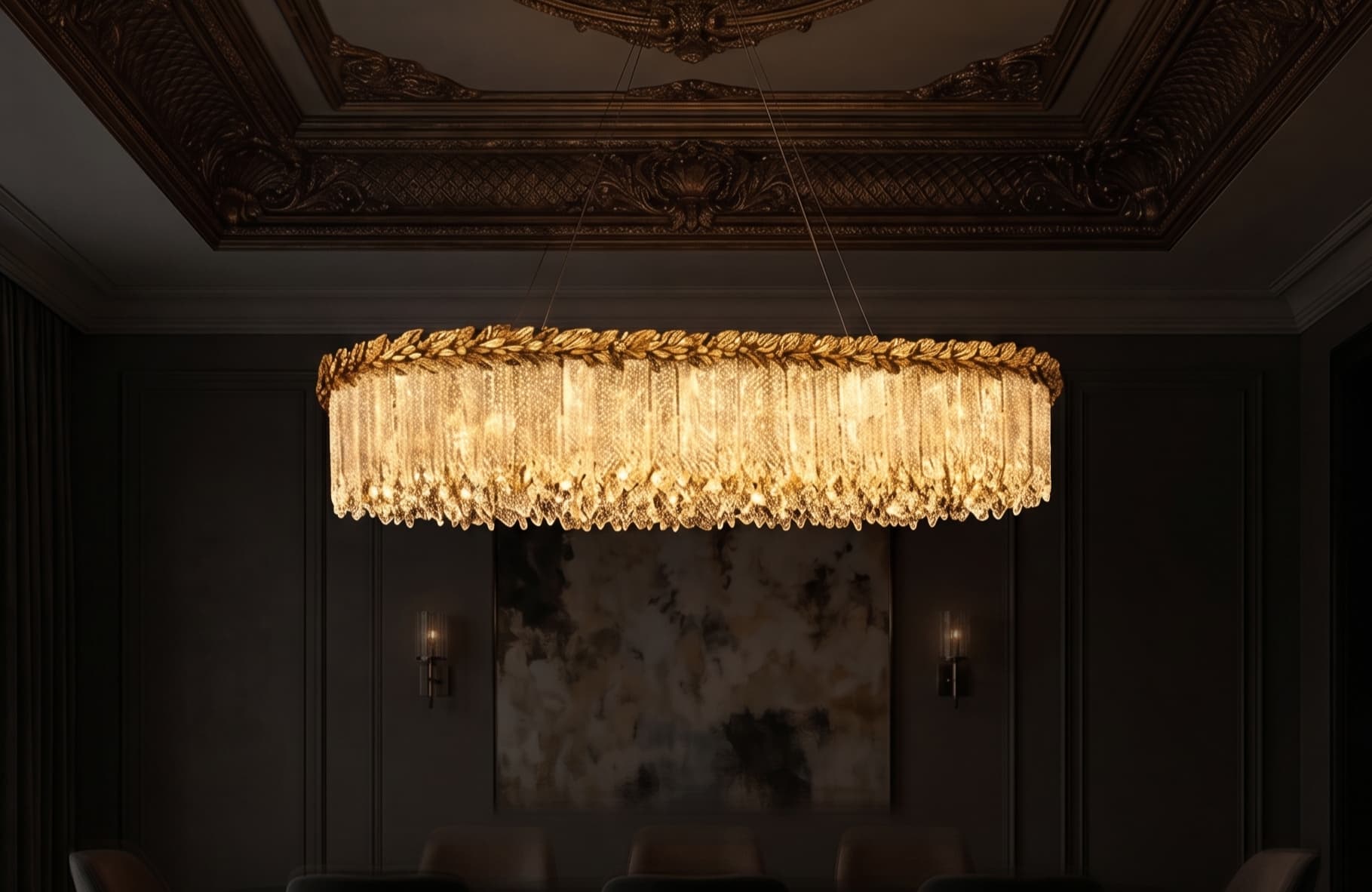 A sculptural gold linear chandelier illuminating an ornate, dimly lit dining room.